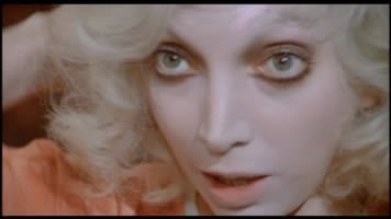 Con Film d&rsquo;amore e d&rsquo;anarchia, ovvero &laquo;Stamattina alle 10 in Via dei Fiori nella nota casa di tolleranza&hellip;&raquo; (1973) Wertm&uuml;ller gioca con la maschera: i capelli biondi sono dello stesso colore dell&rsquo;incarnato, e il trucco fa convergere lo sguardo sugli occhi sgranati dell&rsquo;attrice
