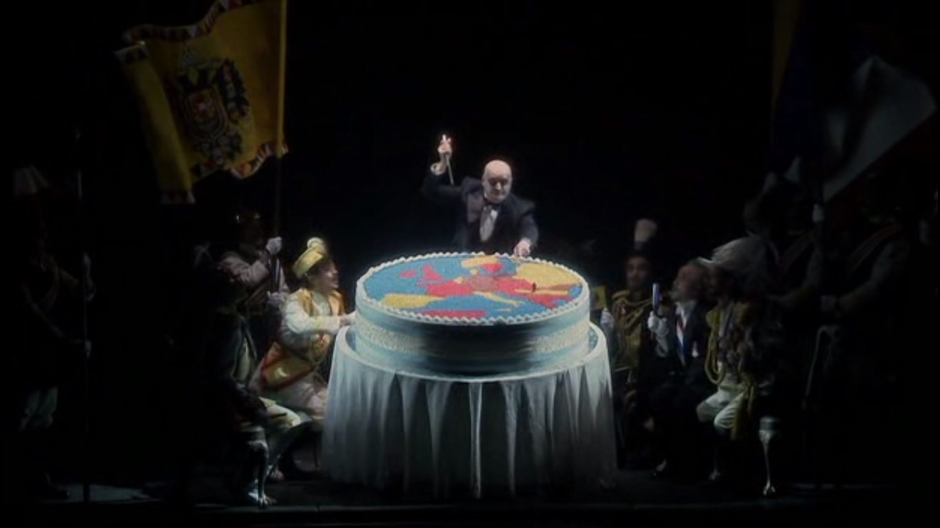 I regnanti europei e Mefistofele nell'atto di dare l’assalto alla torta del Continente, scena tra I e II parte I regnanti europei e Mefistofele nell'atto di dare l’assalto alla torta del Continente, scena tra I e II parte